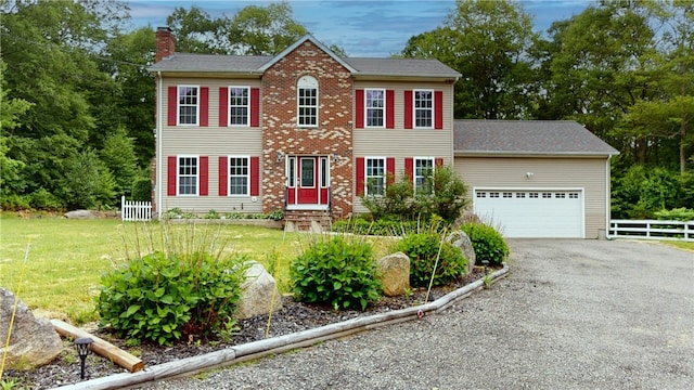 4 Tray Hollow Rd, Foster, RI 02825 - colonial inspired home featuring a chimney, a garage, gravel driveway, and entry steps