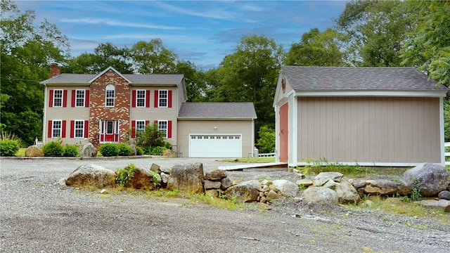 4 Tray Hollow Rd, Foster, RI 02825 - colonial inspired home featuring a chimney, a garage, and driveway