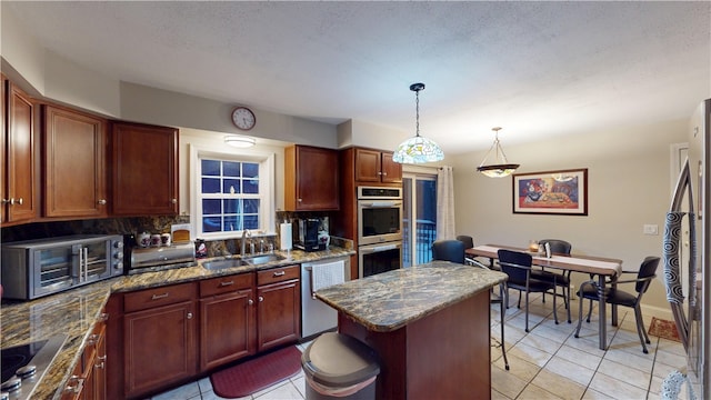 4 Tray Hollow Rd, Foster, RI 02825 - kitchen with stainless steel appliances, decorative backsplash, and dark stone countertops
