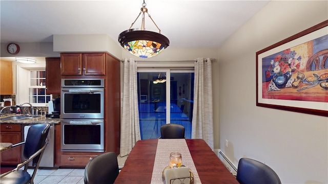 4 Tray Hollow Rd, Foster, RI 02825 - kitchen with double oven, baseboard heating, light tile patterned floors, and decorative light fixtures
