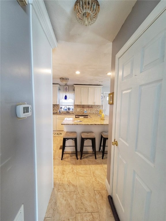 42 Burnside St, Providence, RI 02905 - corridor featuring recessed lighting and a chandelier
