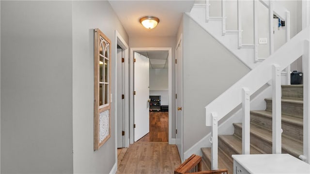 14 Deer Run Dr, Coventry, RI 02816 - corridor with stairs and light wood-style flooring