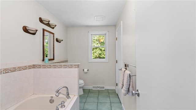 14 Deer Run Dr, Coventry, RI 02816 - bathroom with a garden tub and tile patterned flooring