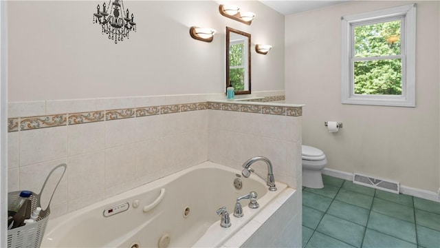 14 Deer Run Dr, Coventry, RI 02816 - bathroom featuring a tub with jets and tile patterned flooring
