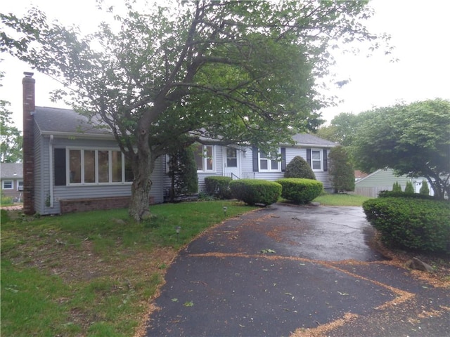 155 Lewiston St, Warwick, RI 02889 - view of front of home featuring a chimney