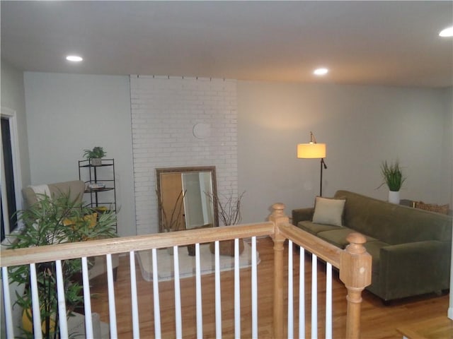 155 Lewiston St, Warwick, RI 02889 - living area featuring wood finished floors, recessed lighting, and a fireplace