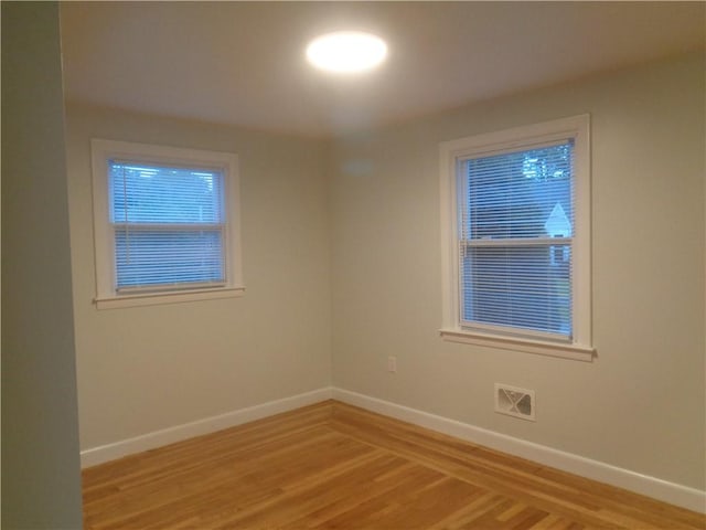 155 Lewiston St, Warwick, RI 02889 - spare room with baseboards and light wood-type flooring