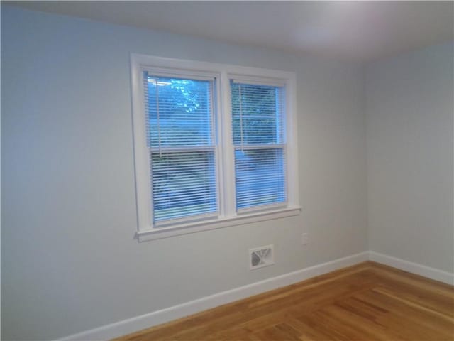 155 Lewiston St, Warwick, RI 02889 - empty room featuring baseboards and light wood finished floors