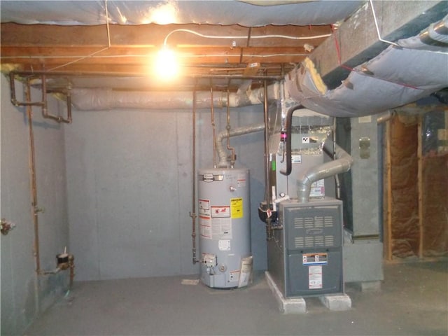 155 Lewiston St, Warwick, RI 02889 - unfinished below grade area featuring gas water heater and heating unit