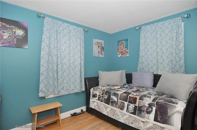 62 Stone Ave, Warwick, RI 02889 - bedroom featuring wood finished floors and baseboards