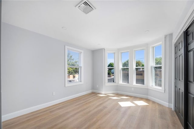 312 Veazie St, Providence, RI 02904 - spare room with plenty of natural light and light wood finished floors