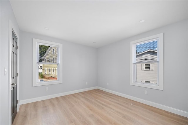 312 Veazie St, Providence, RI 02904 - empty room featuring light wood-style flooring and recessed lighting