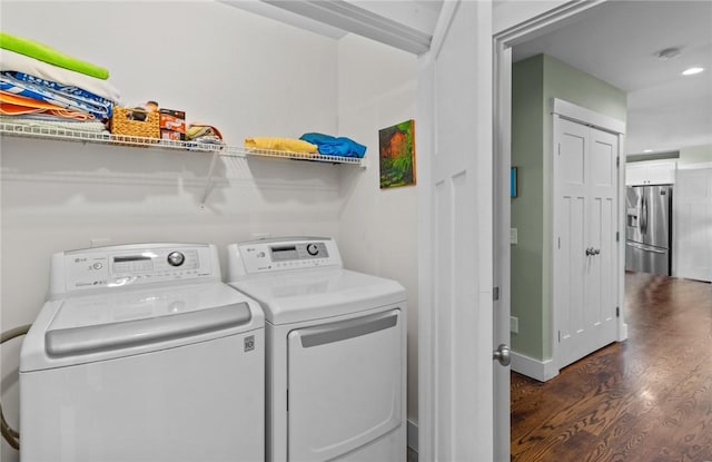83 Silas Hill Way, Exeter, RI 02822 - laundry room with separate washer and dryer and dark wood-type flooring
