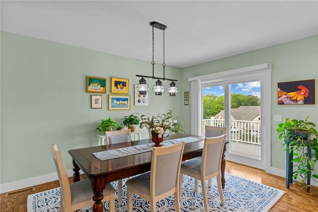 83 Silas Hill Way, Exeter, RI 02822 - dining area featuring baseboards and light wood-type flooring