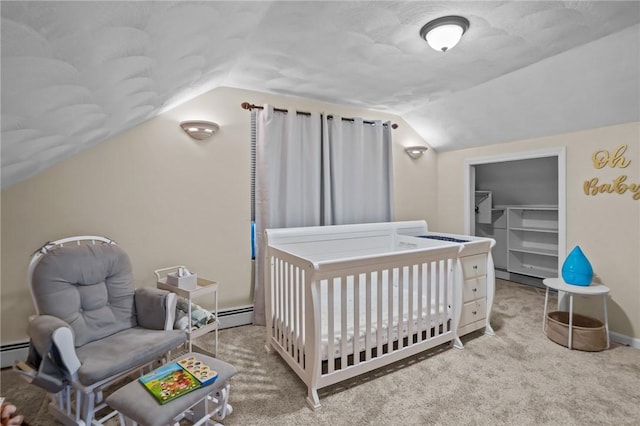 273 Main St, Cranston, RI 02823 - bedroom with lofted ceiling, carpet, a baseboard radiator, a walk in closet, and a closet