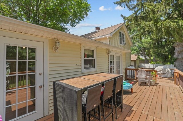 273 Main St, Cranston, RI 02823 - deck featuring french doors and outdoor dining area