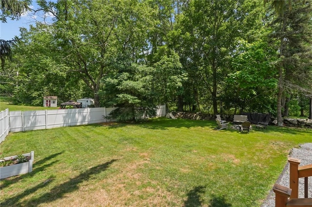 273 Main St, Cranston, RI 02823 - fenced backyard with a fire pit