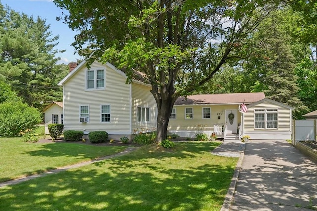 273 Main St, Cranston, RI 02823 - view of front of property featuring asphalt driveway, a chimney, and a front yard