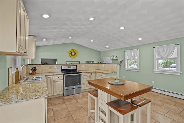 273 Main St, Cranston, RI 02823 - kitchen featuring electric stove, backsplash, lofted ceiling, light stone counters, and light tile patterned flooring