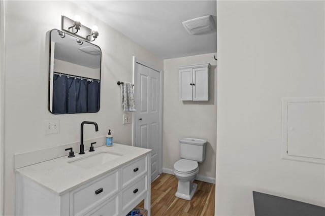 273 Main St, Cranston, RI 02823 - bathroom with vanity and wood finished floors
