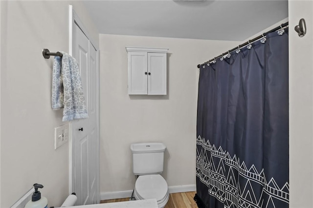 273 Main St, Cranston, RI 02823 - bathroom featuring wood finished floors and curtained shower