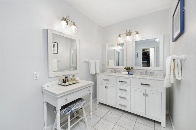34 Finch Ln, North Kingstown, RI 02874 - full bath featuring double vanity and tile patterned flooring