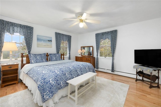 34 Finch Ln, North Kingstown, RI 02874 - bedroom with multiple windows, wood finished floors, and a ceiling fan