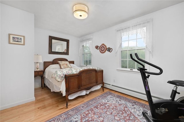 34 Finch Ln, North Kingstown, RI 02874 - bedroom featuring light wood-type flooring and baseboards