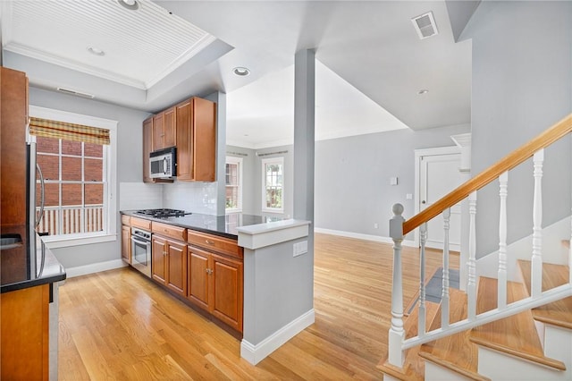 279 Benefit St Unit 3, Providence, RI 02903 - kitchen with stainless steel appliances, light wood-style floors, healthy amount of natural light, recessed lighting, and ornamental molding