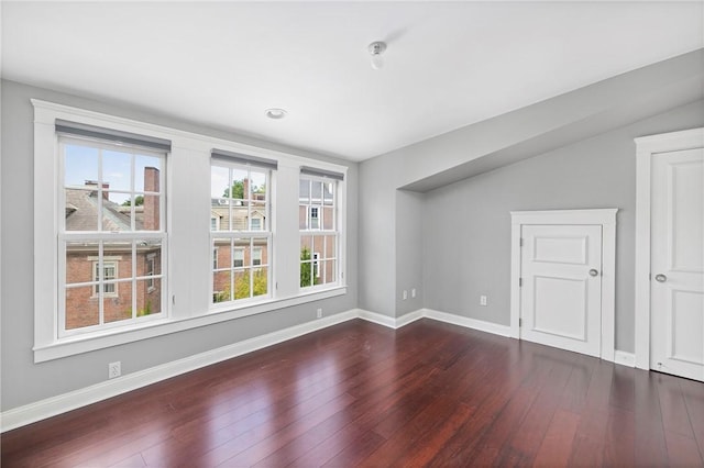 279 Benefit St Unit 3, Providence, RI 02903 - empty room featuring wood-type flooring and vaulted ceiling