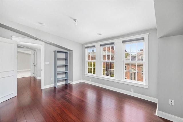 279 Benefit St Unit 3, Providence, RI 02903 - unfurnished room with dark wood-style flooring and baseboards