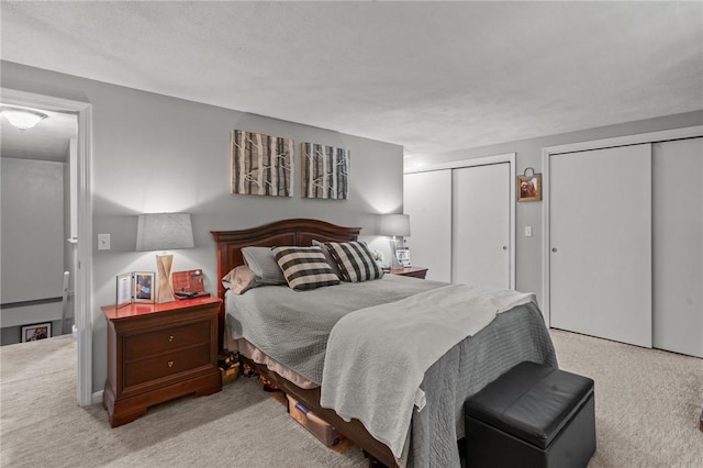 47 Pheasant Run Unit A, Smithfield, RI 02917 - carpeted bedroom featuring two closets