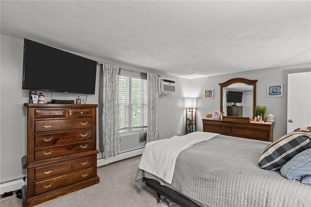 47 Pheasant Run Unit A, Smithfield, RI 02917 - carpeted bedroom featuring a baseboard heating unit and a wall mounted air conditioner