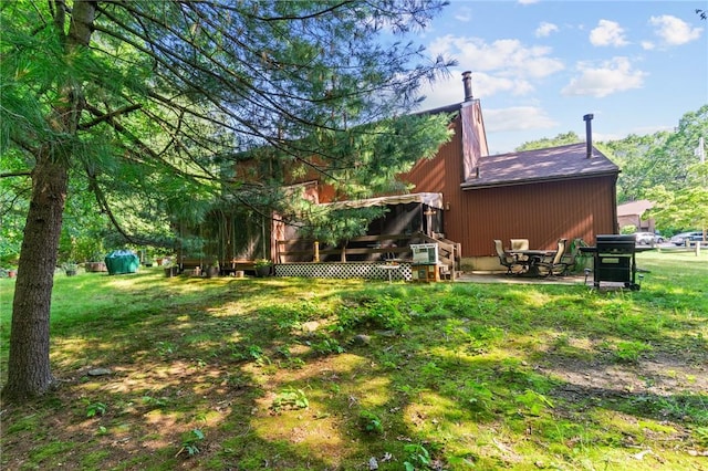 47 Pheasant Run Unit A, Smithfield, RI 02917 - view of green lawn with a deck