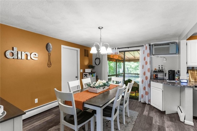47 Pheasant Run Unit A, Smithfield, RI 02917 - dining area featuring a baseboard heating unit, dark wood-style flooring, a chandelier, and a wall mounted air conditioner