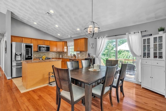 1060 Joslin Rd, Burrillville, RI 02830 - dining room featuring lofted ceiling, a chandelier, light wood finished floors, and recessed lighting
