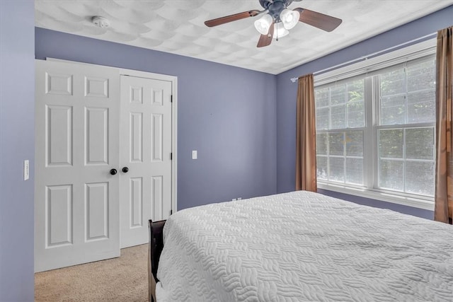 1060 Joslin Rd, Burrillville, RI 02830 - bedroom featuring carpet floors, a closet, and ceiling fan