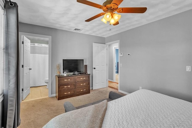 1060 Joslin Rd, Burrillville, RI 02830 - bedroom with light carpet, a ceiling fan, and ensuite bathroom