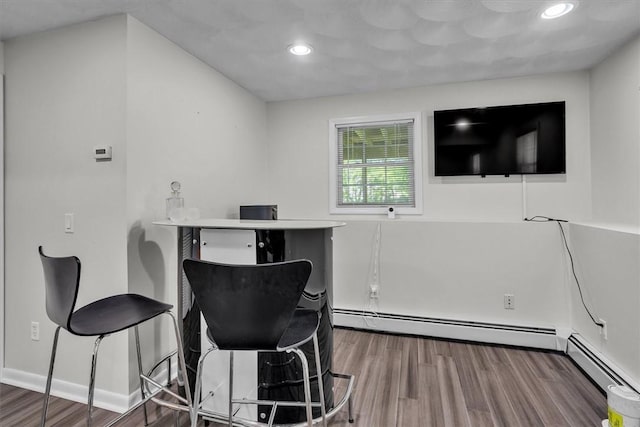 1060 Joslin Rd, Burrillville, RI 02830 - office space featuring wood finished floors, recessed lighting, and a baseboard radiator