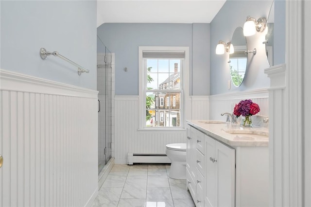 1 Slocum St, Newport, RI 02840 - full bath with a baseboard radiator, marble look tile flooring, a wainscoted wall, double vanity, and a shower stall