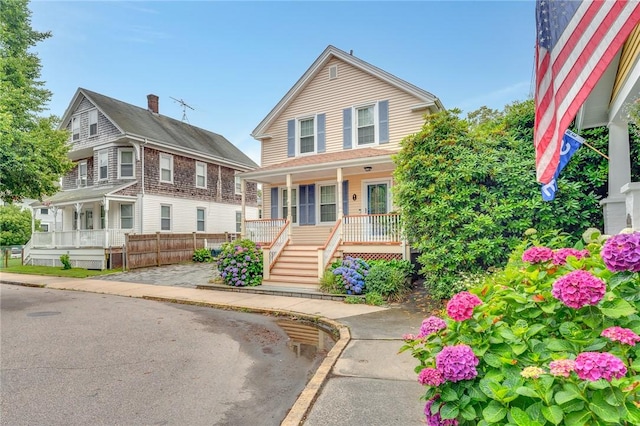 1 Slocum St, Newport, RI 02840 - view of front facade with covered porch and stairs