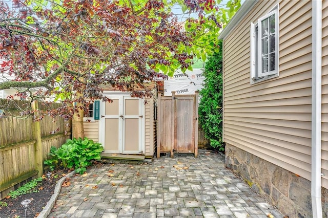 1 Slocum St, Newport, RI 02840 - fenced backyard with a shed and a patio