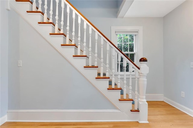 1 Slocum St, Newport, RI 02840 - staircase featuring wood finished floors and beam ceiling