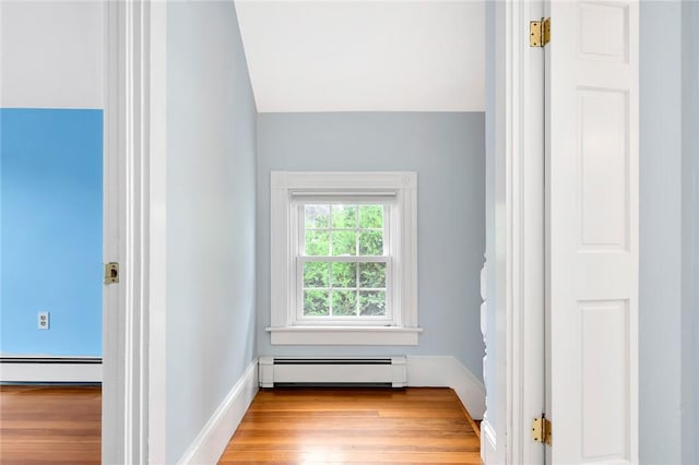 1 Slocum St, Newport, RI 02840 - hall with a baseboard heating unit and wood finished floors