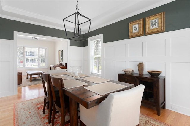 9 Scarlett Way, Cranston, RI 02921 - dining room featuring a decorative wall, a chandelier, light wood finished floors, crown molding, and plenty of natural light