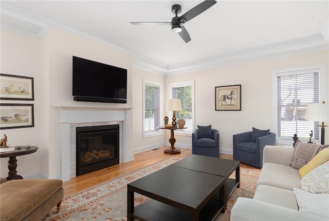 9 Scarlett Way, Cranston, RI 02921 - living area featuring wood finished floors, ceiling fan, crown molding, and a glass covered fireplace