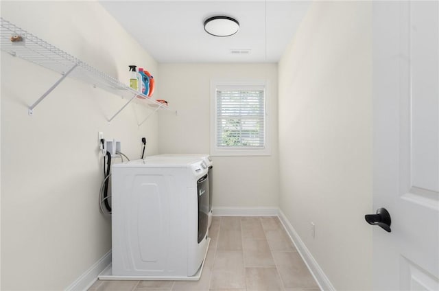 9 Scarlett Way, Cranston, RI 02921 - laundry room featuring separate washer and dryer and light tile patterned floors