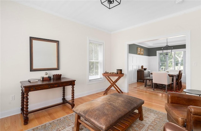 9 Scarlett Way, Cranston, RI 02921 - living area featuring light wood-type flooring and crown molding