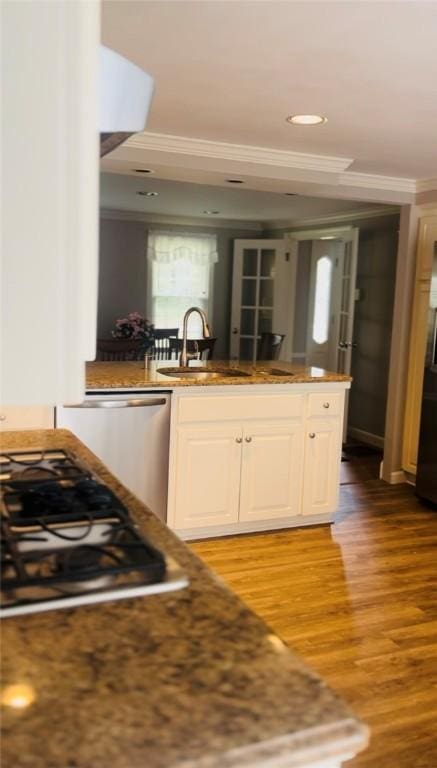 199 Love Ln, Warwick, RI 02886 - kitchen featuring ornamental molding, light wood-style floors, white cabinets, and stainless steel gas cooktop