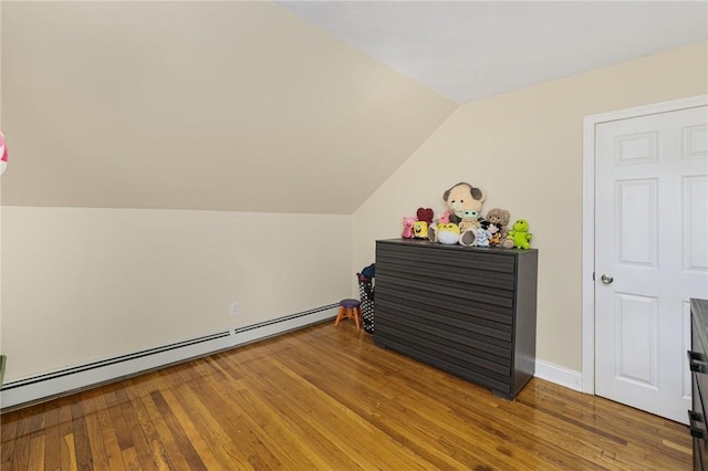 2 Palfrey Pl, Providence, RI 02909 - additional living space featuring a baseboard heating unit, vaulted ceiling, and light wood finished floors